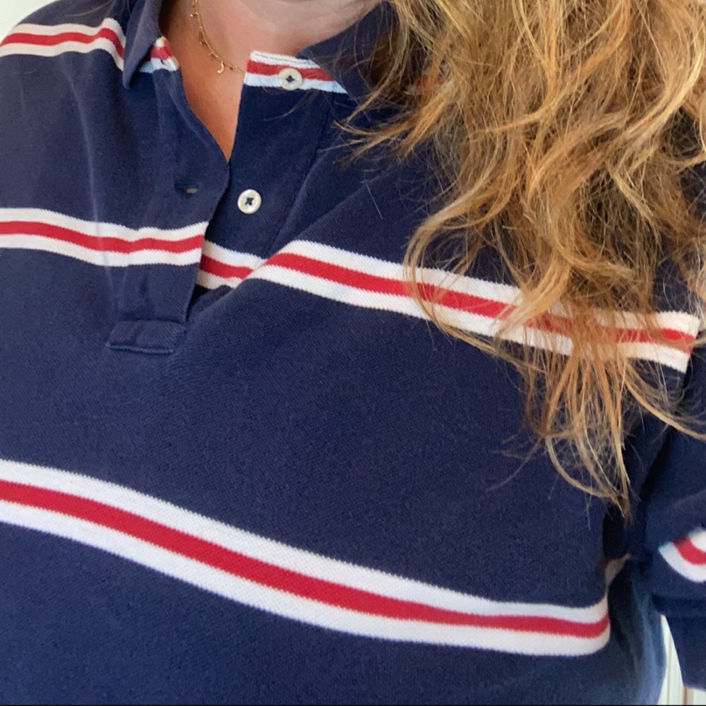 Men’s red, white, and blue yellow pony polo.